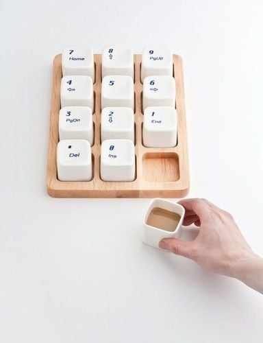 Fancy - Keyboard Coffee Cups by E Square. These would be great for an office next to the coffee machine or a good gift for a techie friend!