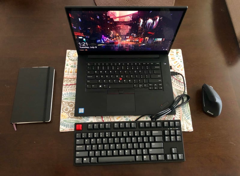 Minimalist work from home setup with my P1 mobile workstation (+ Levkey wireless vertical mouse, iKBC CD87 TKL Mechanical Keyboard and Moleskin notebook) : r/thinkpad